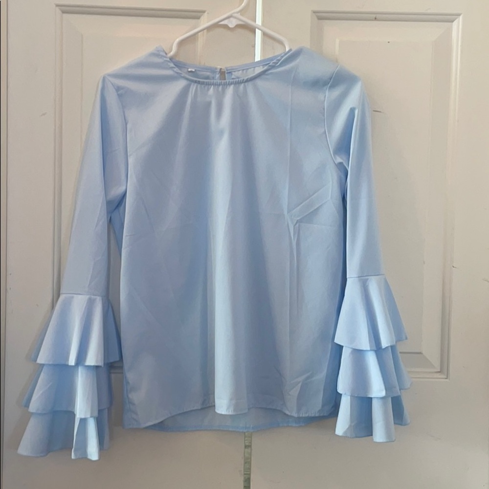 Light blue top